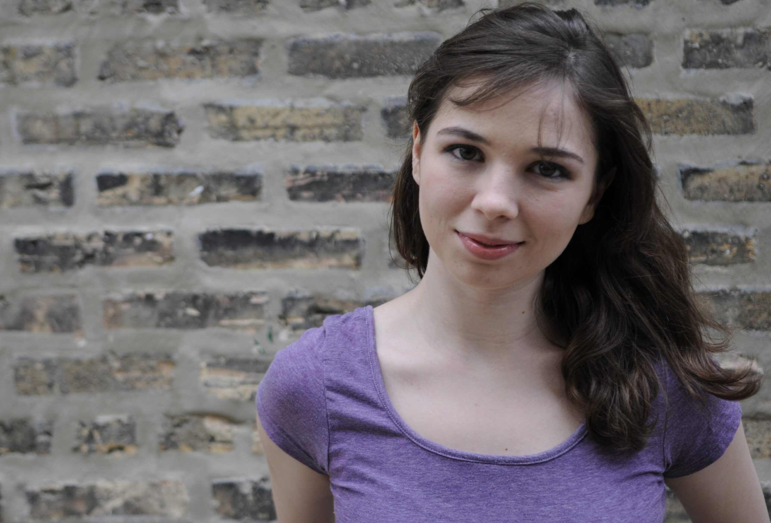 Antora DeLong Headshot (2) piven-theatre-jay-reed
